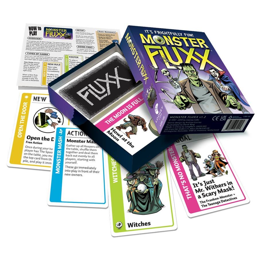 Monster Fluxx box with some game cards laid out