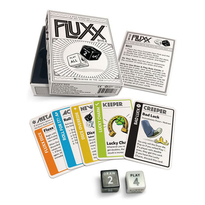 Fluxx Dice Game with some cards laid out.